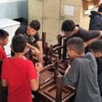Students learning carpentry